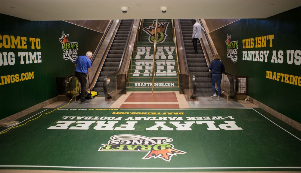 A picture depicting mass Draft Kings advertising in a subway station